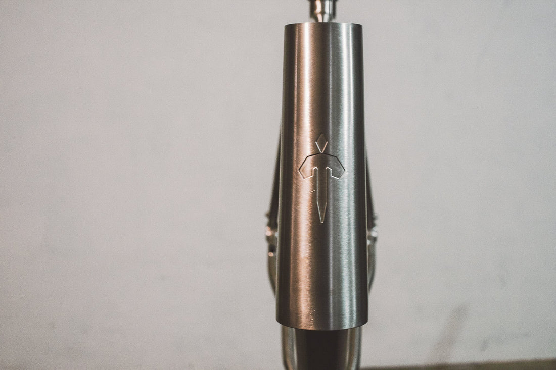 Close-up detail of a Tizona titanium bike frame